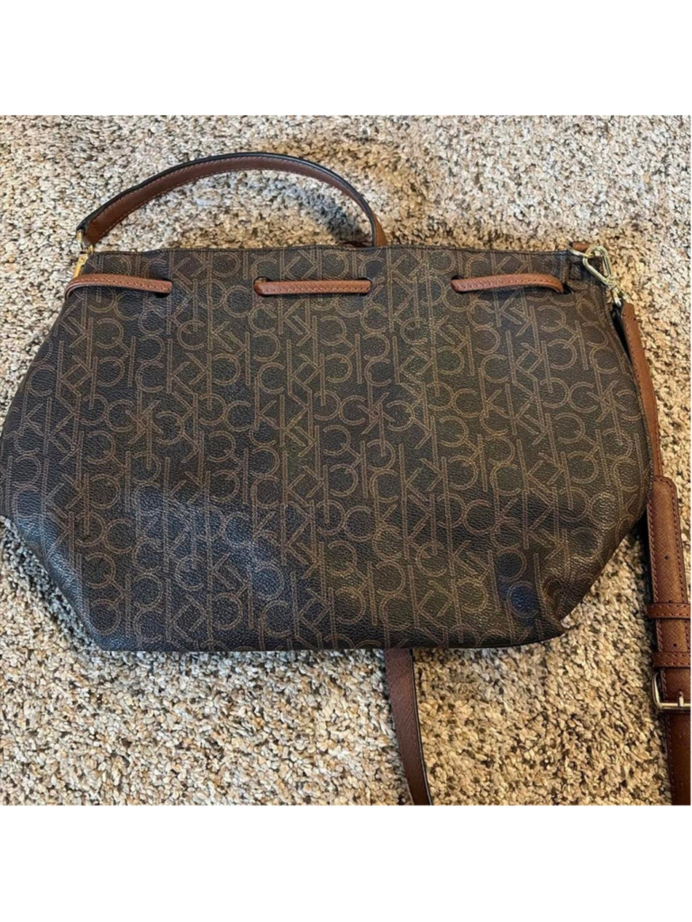 Calvin Klein Brown and tan leather tote bag with repeating monogram pattern #tot